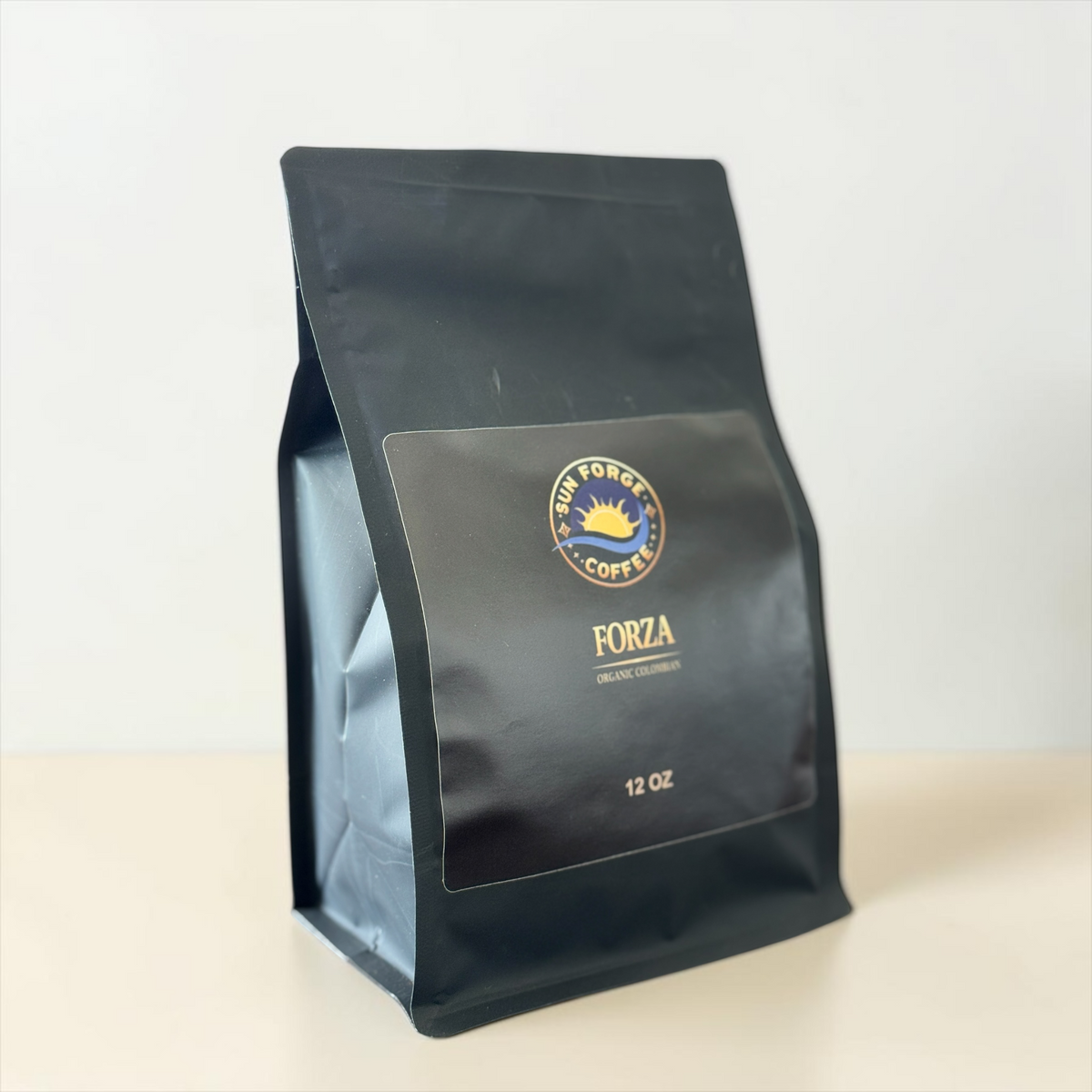Forza Colombian at SunForge Coffee, organic ground coffee, 12 oz, side packaging view.