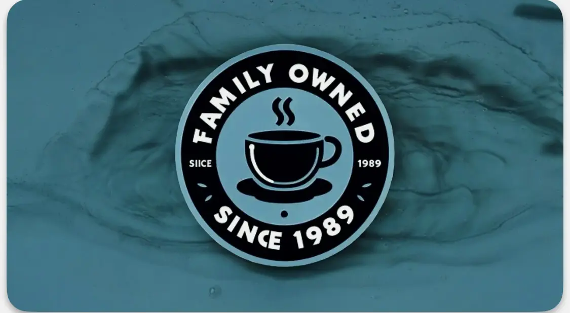 A family owned coffee shop logo on the side of a building.